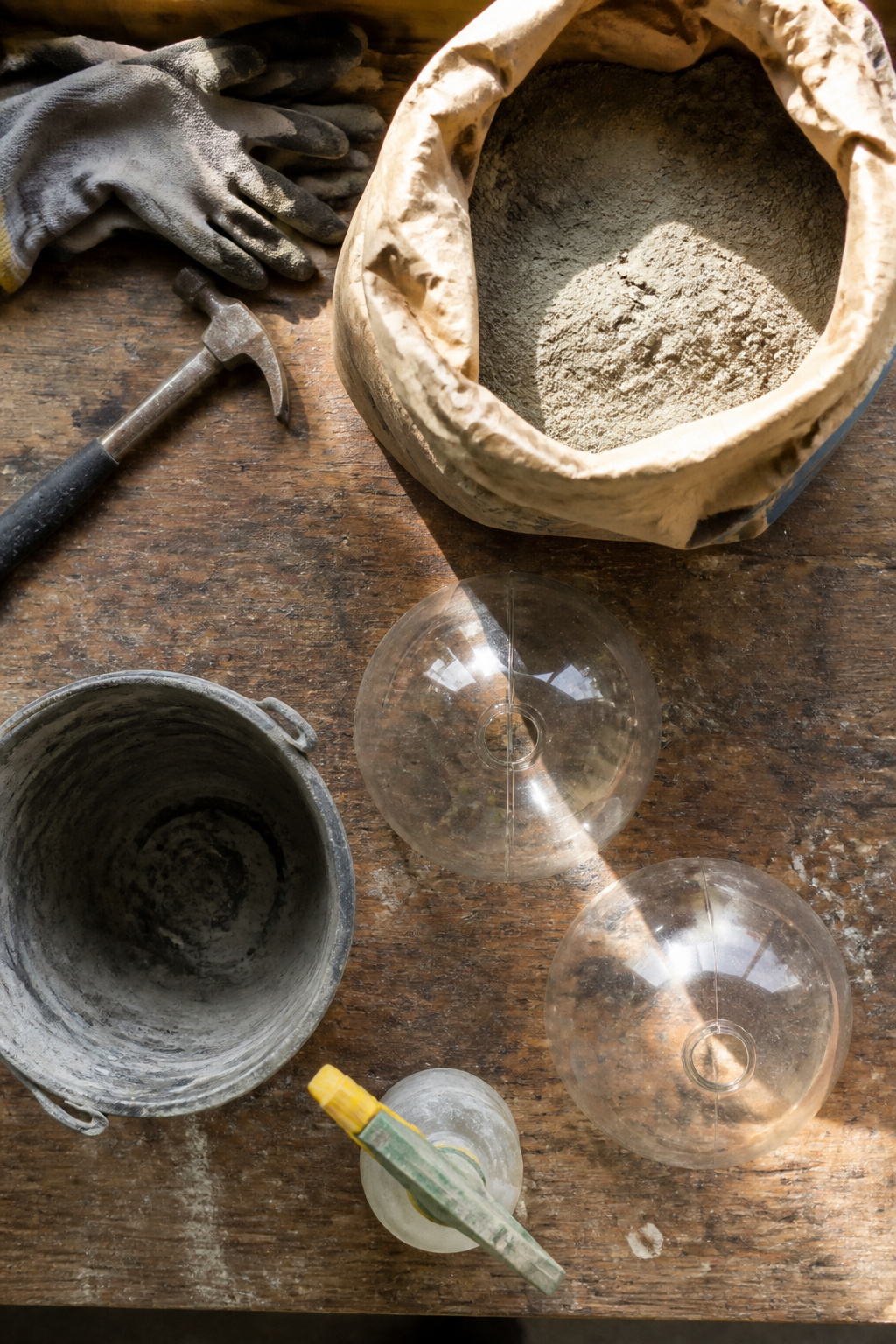 DIY Concrete Garden Orbs: A Step-by-Step Guide for 2026 1 Glass lamp globes arranged on a surface for DIY project.